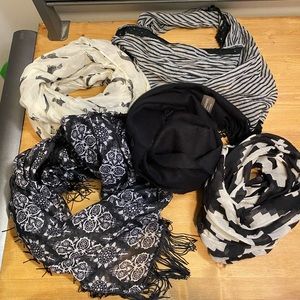 Set of five accent scarves.